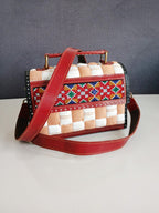 Sandook - A Sujni Sandook bag with leather and embroidery work