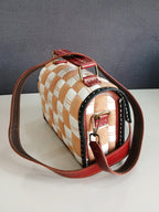 Sandook - A Sujni Sandook bag with leather and embroidery work